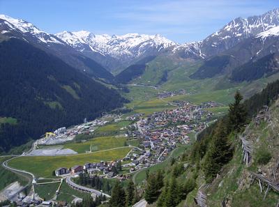 Sedrun including the Neat construction site (center), Ual Surrein (left) and Uaul Bugnei (right)